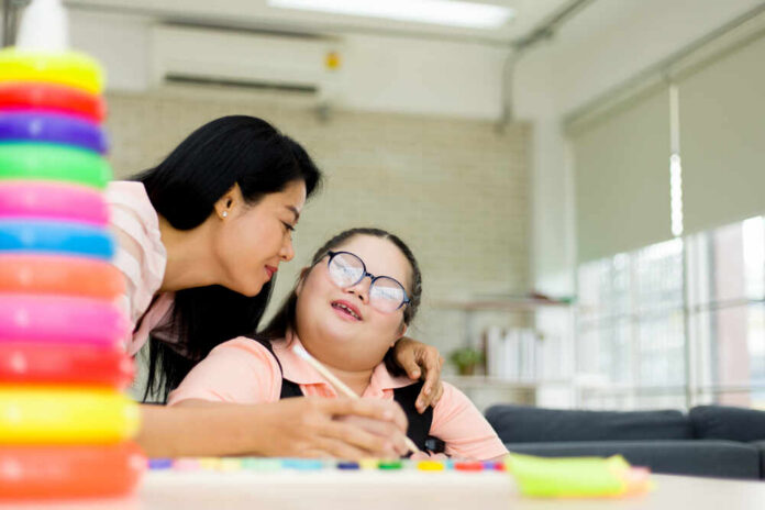 Mom,Is,Teaching,An,Autism,Daughter,To,Write,Her,Own