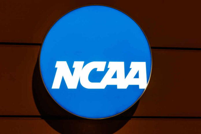 shutterstock_1419645980.jpg NCAA logo displayed on a blue circular sign