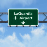 Road sign indicating direction to LaGuardia Airport
