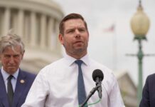 Democratic Unity Shattered by Swalwell Controversy A politician speaking at a press conference outside the Capitol building
