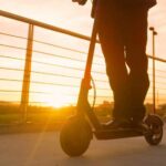 DUI Scandal Erupts: Congressman’s Scooter Secret Person riding an electric scooter during sunset