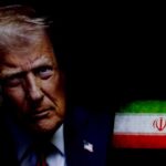 GOP Faces Internal Struggle Over Iran Close-up portrait of a man with a serious expression, with the Iranian flag in the background