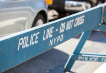 Gunmen Turn Playground Into Chaos — Who’s Responsible? Blue NYPD barricade with Police Line - Do Not Cross.