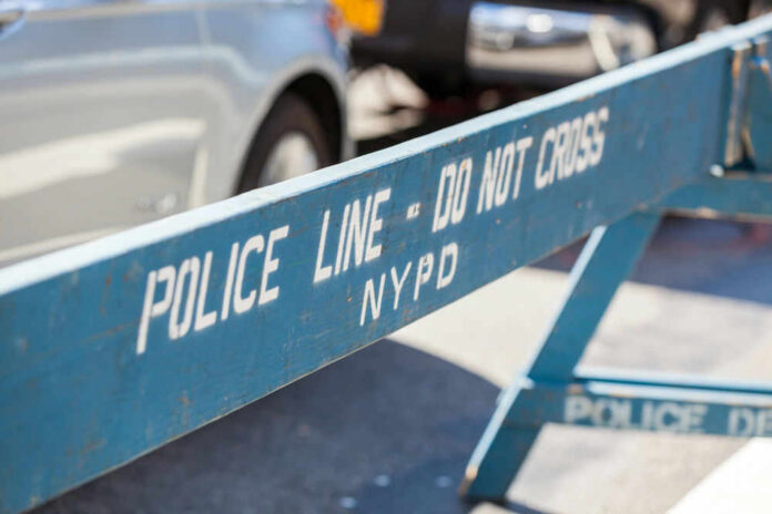 59553801 Blue NYPD barricade with Police Line - Do Not Cross.