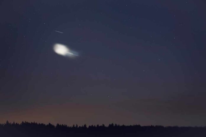 shutterstock_2149896653.jpg A cloudy formation in the night sky with stars visible