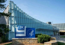 Ebola Alarm Blows Up — Where’s The Risk? CDC headquarters building with signage and blue sky