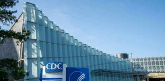 CDC headquarters building with signage and blue sky