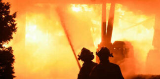 Firefighters battling intense blaze at night