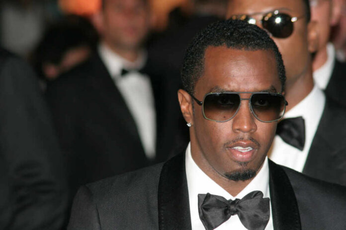 sean-diddy-combs43980217jpg Man wearing tuxedo and sunglasses at formal event