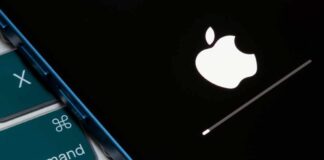 Apple logo displayed on a black screen with a loading bar