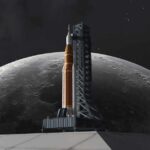 A rocket on a launch pad with the moon in the background