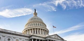 United States Capitol building under a blue sky