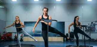 Women exercising on mini trampolines in a fitness class